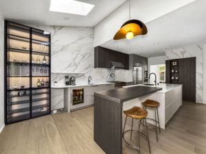 Luxury European kitchen Redmond WA — grey island dark wood marble backsplash